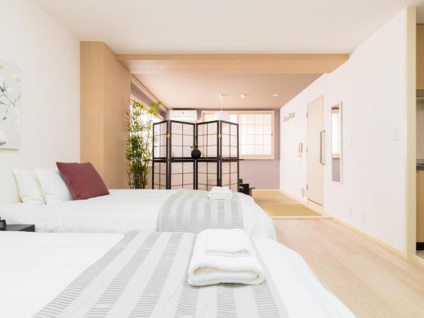 GuestHouse MIYABI : photo 7 de la chambre chambre quadruple avec salle de bains privative