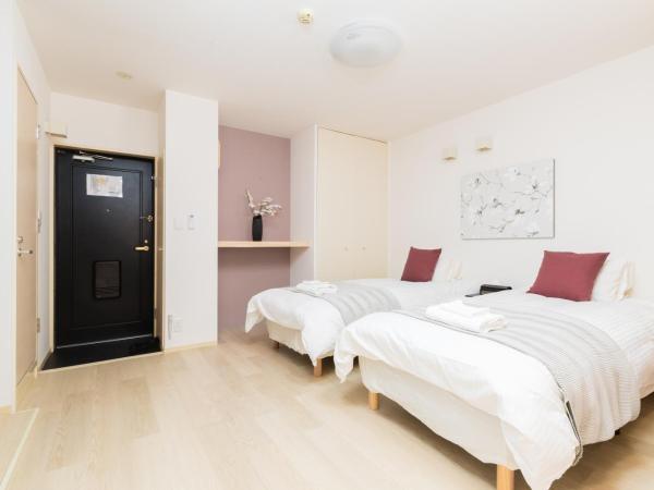 GuestHouse MIYABI : photo 8 de la chambre chambre quadruple avec salle de bains privative