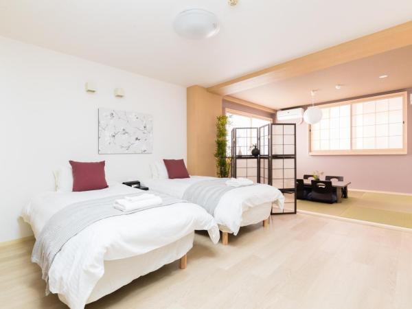 GuestHouse MIYABI : photo 9 de la chambre chambre quadruple avec salle de bains privative