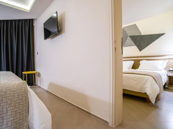Emmantina Hotel : photo 4 de la chambre chambres doubles ou lits jumeaux communicantes - vue latérale sur mer
