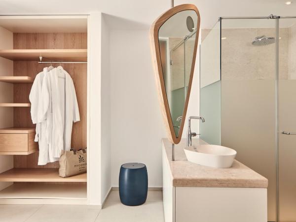 Myconian Kyma, a Member of Design Hotels : photo 3 de la chambre suite junior avec jacuzzi extérieur - vue sur mer couché de soleil