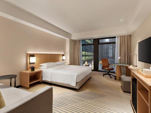 Hyatt Place Chengdu Pebble Walk : photo 2 de la chambre chambre lit king-size avec canapé-lit