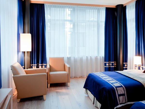 Hótel Reykjavík Grand : photo 1 de la chambre chambre lits jumeaux - vue sur atrium