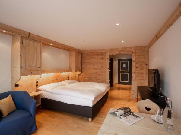 Bernerhof Swiss Quality Hotel Gstaad : photo 2 de la chambre chalet avec chambre double