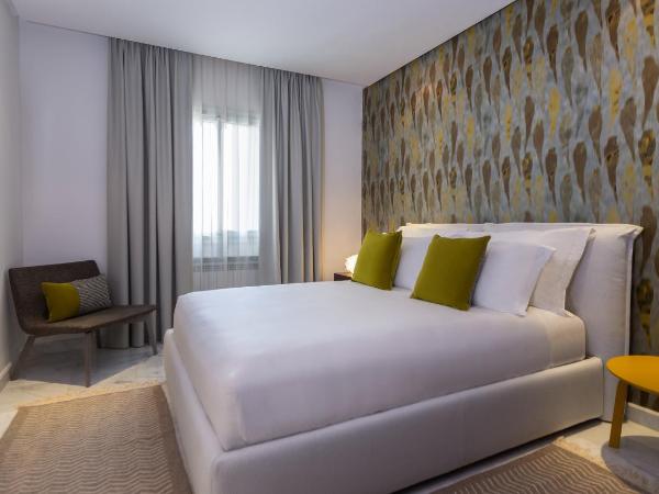 ADAM Hotel Suites : photo 2 de la chambre suite deluxe lit king-size - vue sur lac