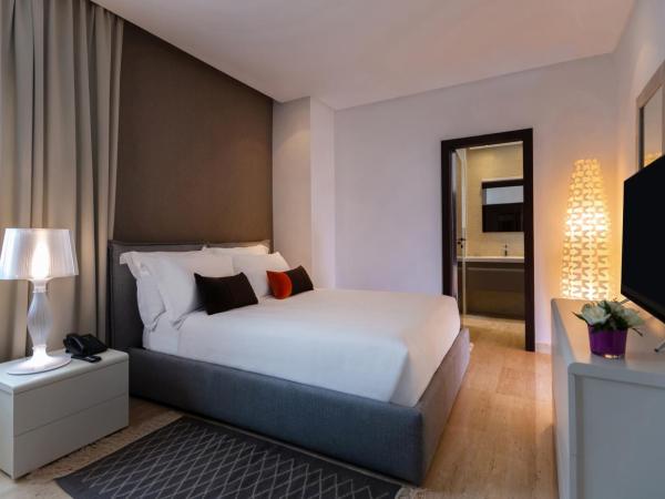 ADAM Hotel Suites : photo 6 de la chambre suite prestige avec terrasse – vue sur lac