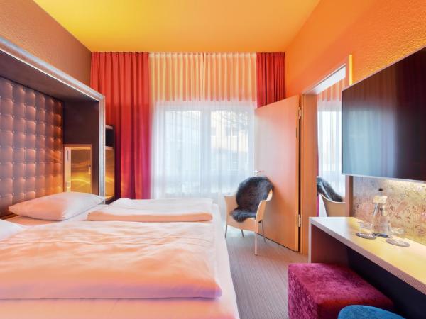 Designhotel + CongressCentrum Wienecke XI. : photo 3 de la chambre chambre familiale
