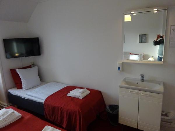 City Hotel Nebo : photo 4 de la chambre chambre triple Économique avec salle de bains commune