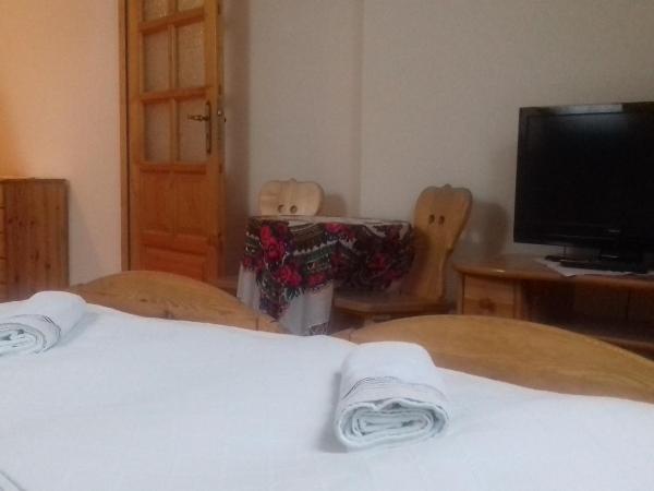 Biały Dworek : photo 2 de la chambre chambre quadruple