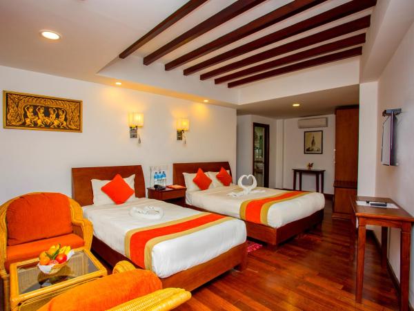 Apsara Boutique Hotel : photo 7 de la chambre chambre familiale de luxe avec vue sur jardin