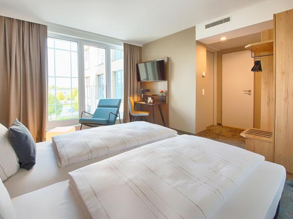 LOGINN Hotel Leipzig : photo 2 de la chambre suite junior