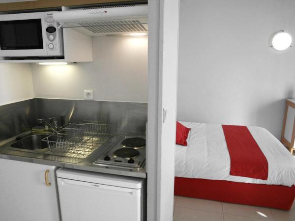 Résidences Guerlin : photo 9 de la chambre appartement avec balcon