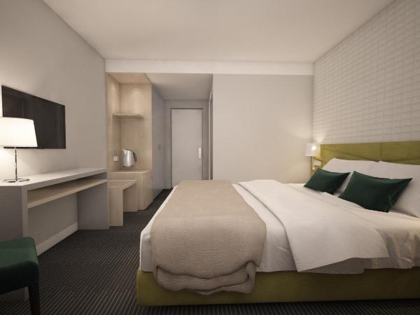 Masa Hotel 5 de Outubro : photo 4 de la chambre chambre lits jumeaux