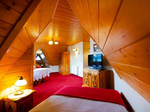 Zakopiański Dwór : photo 2 de la chambre chambre lits jumeaux