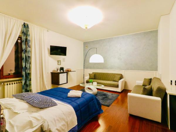 Vitti's Home Verona : photo 2 de la chambre chambre quadruple premium