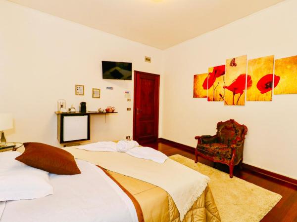 Vitti's Home Verona : photo 4 de la chambre chambre triple confort