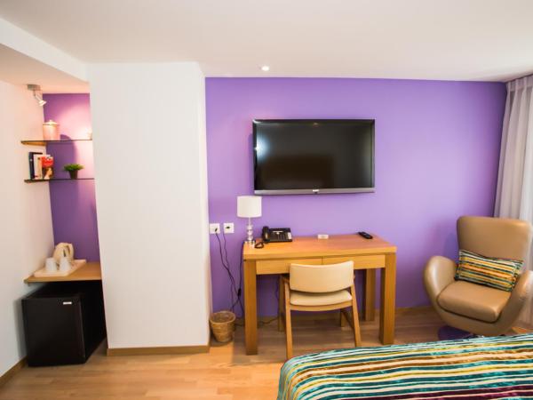 Guest House Le Charlot : photo 3 de la chambre chambre double supérieure - vue sur jardin