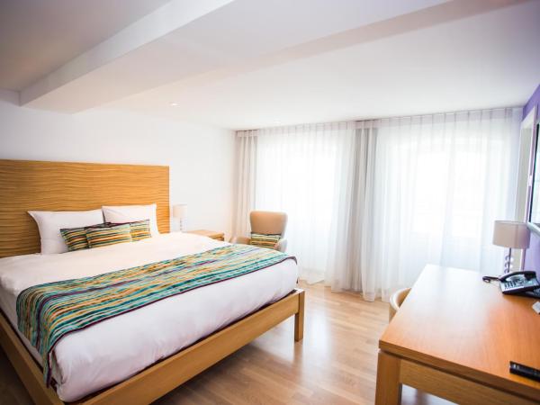 Guest House Le Charlot : photo 9 de la chambre chambre double deluxe - vue sur lac