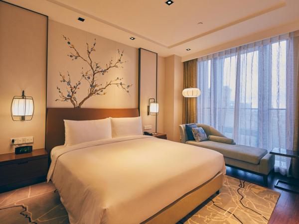 LJZ Supreme Tower Hotel : photo 3 de la chambre chambre lit queen-size deluxe