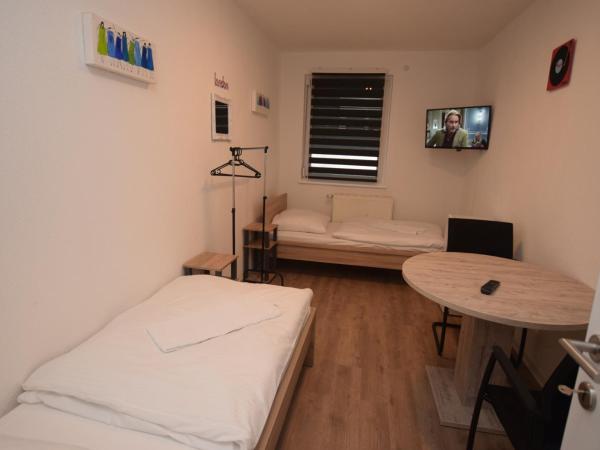AB Möhringen Messe Zimmer : photo 5 de la chambre chambre lits jumeaux avec salle de bains commune