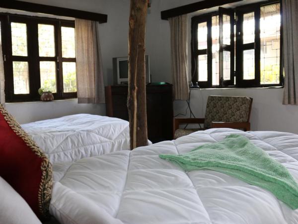 Gurkha Lodge : photo 2 de la chambre chambre lits jumeaux avec salle de bains privative
