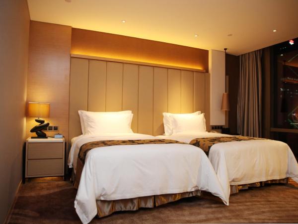 Shenzhen Futian Wyndham Grand : photo 2 de la chambre chambre lits jumeaux supérieure