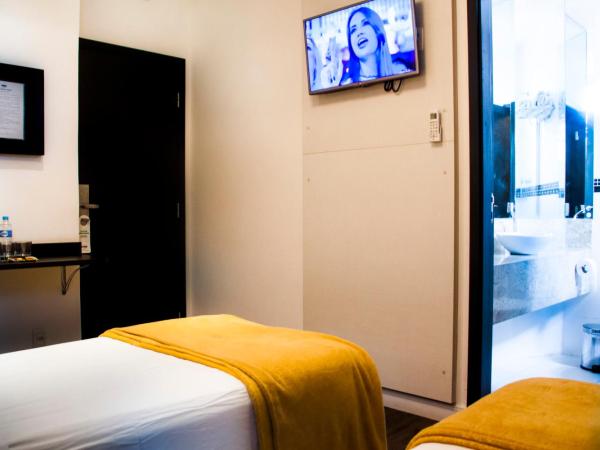 Bras Palace Hotel : photo 2 de la chambre chambre triple deluxe