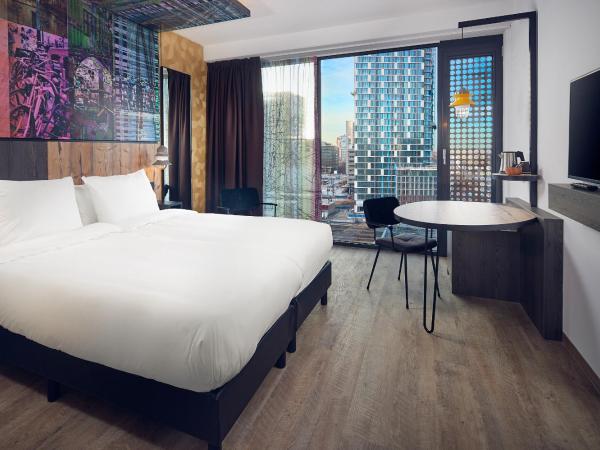 Inntel Hotels Utrecht Centre : photo 3 de la chambre chambre lits jumeaux ville