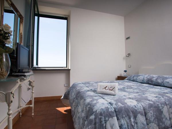 Agriturismo Villa Lupara : photo 1 de la chambre chambre triple standard - vue sur mer