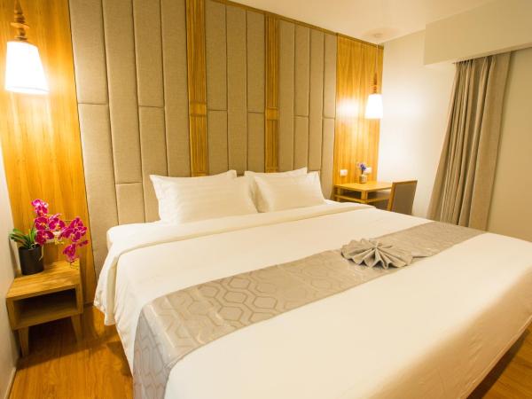 Lanna Thaphae Hotel : photo 6 de la chambre chambre lit king-size ou lits jumeaux supérieure