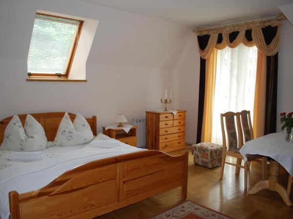 Biały Dworek : photo 5 de la chambre chambre familiale