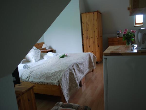 Biały Dworek : photo 2 de la chambre chambre triple
