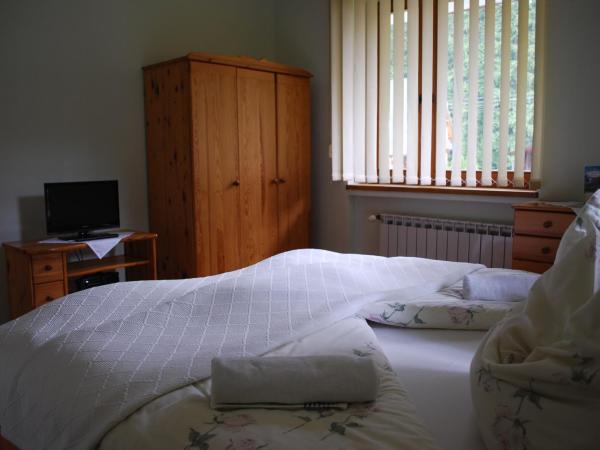 Biały Dworek : photo 9 de la chambre chambre triple