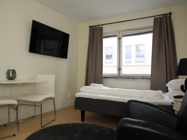 Fastliving Apartment Hotel : photo 1 de la chambre petit studio