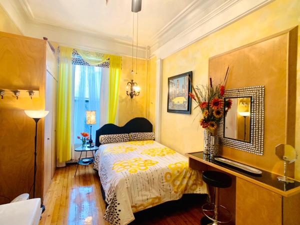 The International Cozy Inn : photo 4 de la chambre suite lit double avec salle de bains commune