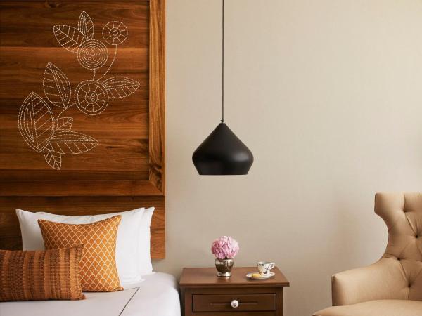 Taj Aravali Resort & Spa Udaipur : photo 4 de la chambre deluxe room with garden view and balcony king bed