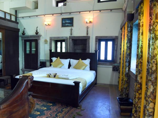 The Thikana Heritage : photo 1 de la chambre suite lit king-size avec balcon