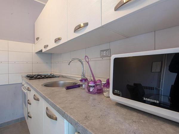 Lovely Family House Robi : photo 1 de la chambre chambre double deluxe avec lit d'appoint