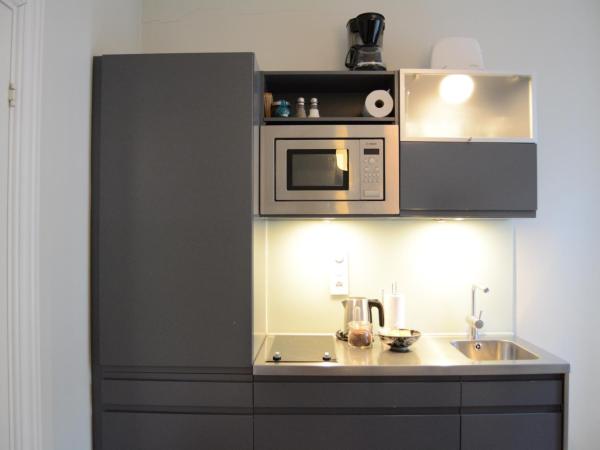 DA Hotel Apartments : photo 4 de la chambre studio