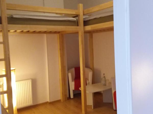 Living in the Box : photo 2 de la chambre petite chambre lits jumeaux