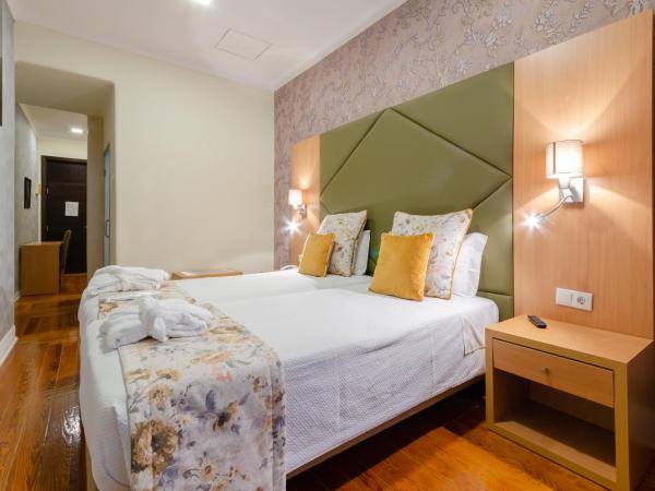 Hotel INN Rossio : photo 4 de la chambre chambre triple supérieure