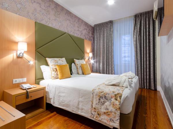 Hotel INN Rossio : photo 4 de la chambre chambre lits jumeaux supérieure