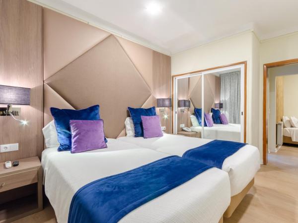 Hotel INN Rossio : photo 1 de la chambre chambre triple standard