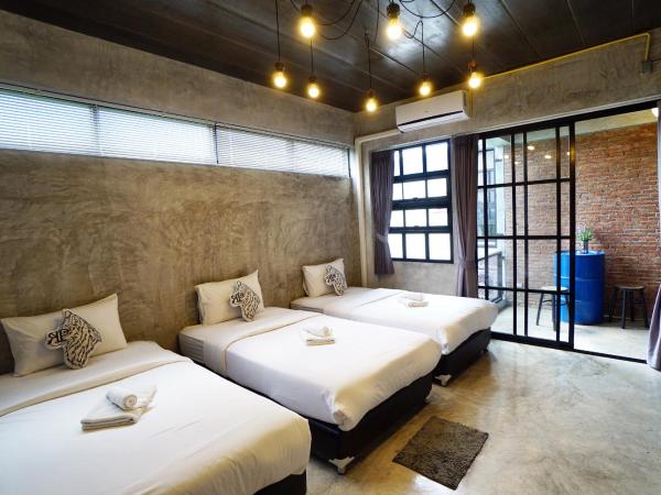 Rumpai Loft Habitat : photo 1 de la chambre chambre triple avec salle de bains privative