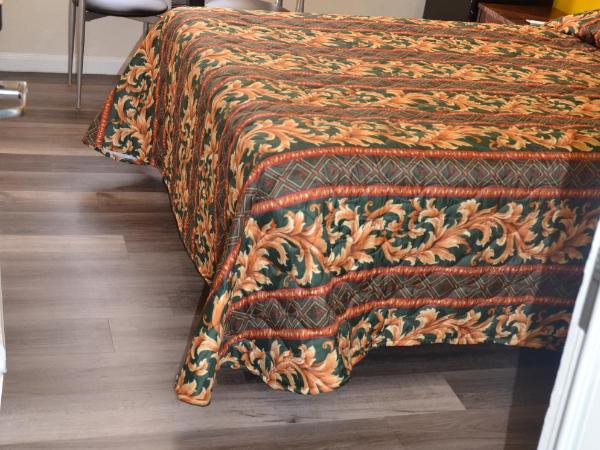 Hotel Sunrise : photo 1 de la chambre chambre lit queen-size 