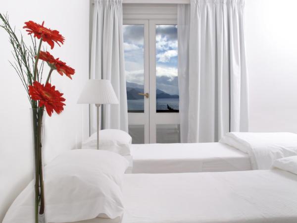 Hotel Tunquelén : photo 2 de la chambre chambre double ou lits jumeaux supérieure - vue sur lac