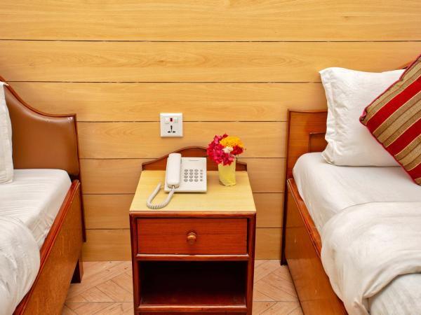 Hotel Grand Holiday : photo 3 de la chambre chambre lits jumeaux deluxe