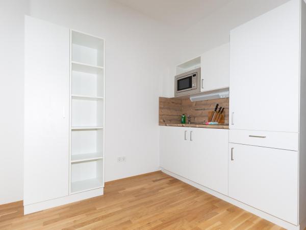 My room serviced apartment-Messe : photo 9 de la chambre appartement avec balcon