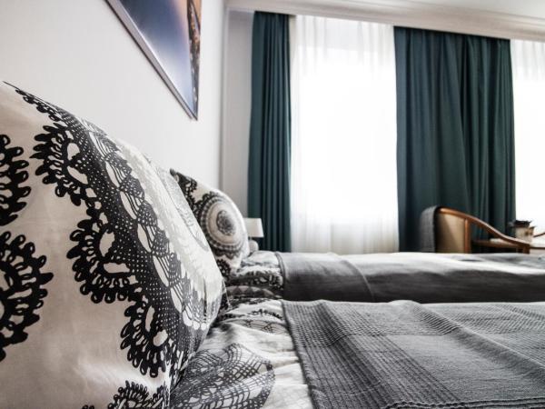 Bielski Guesthouse : photo 3 de la chambre chambre quadruple avec salle de bains commune