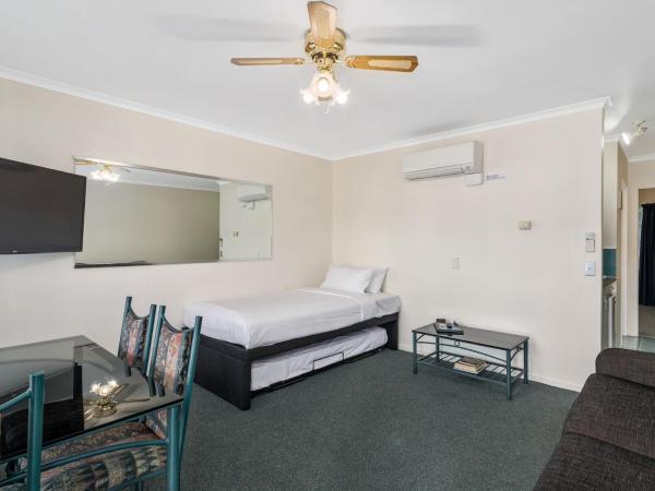 ASURE PRINCE motor lodge : photo 2 de la chambre appartement 1 chambre avec baignoire spa